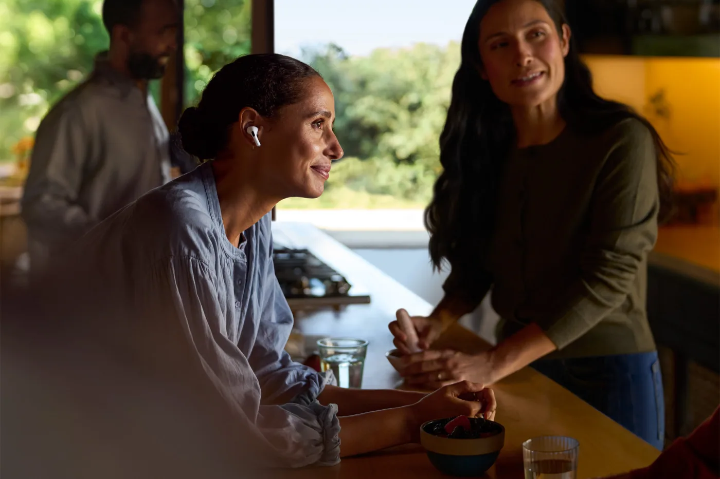 Person wearing AirPods 4 with Active Noise Cancellation