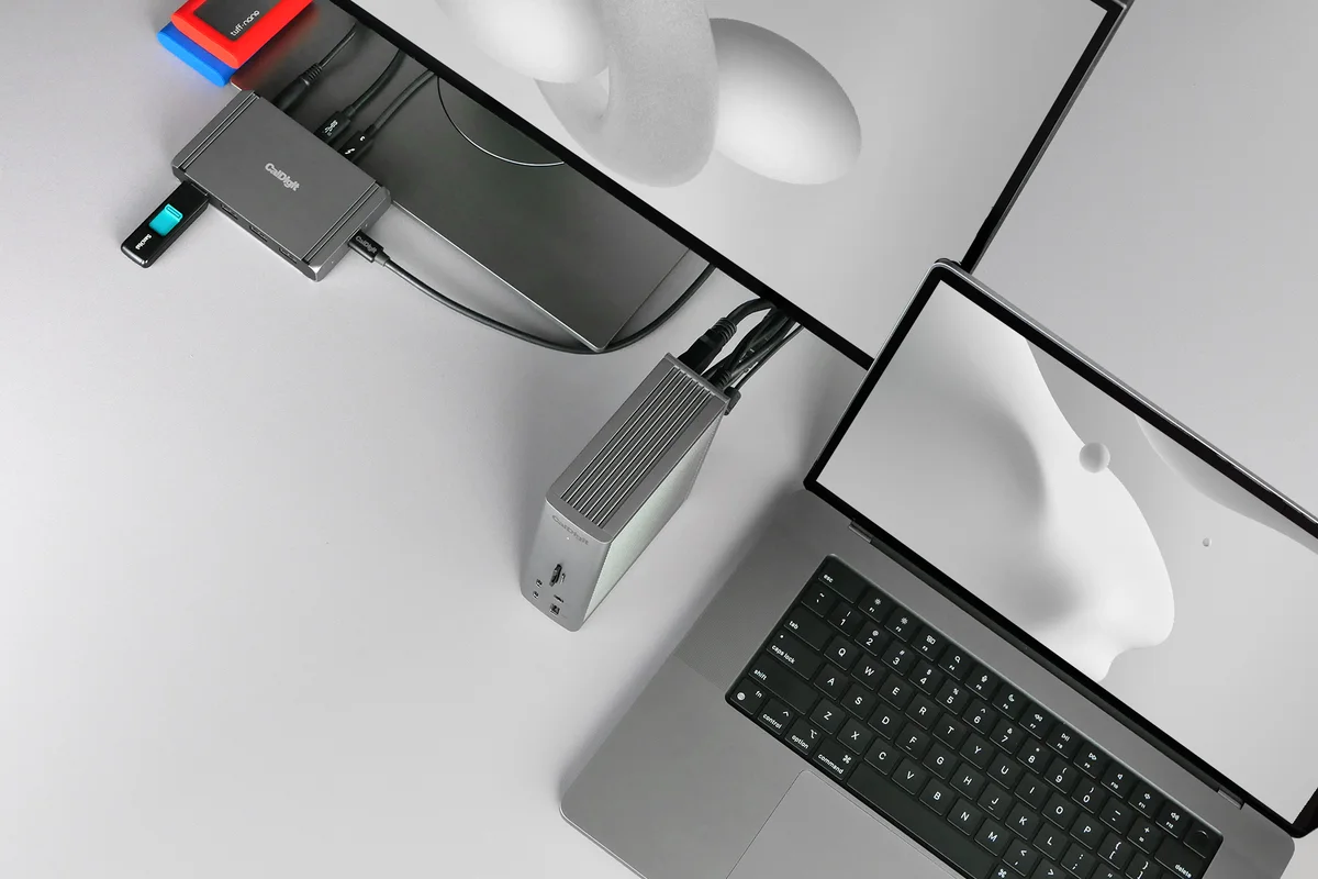 CalDigit TS4 Thunderbolt dock in a multi-display desk setup