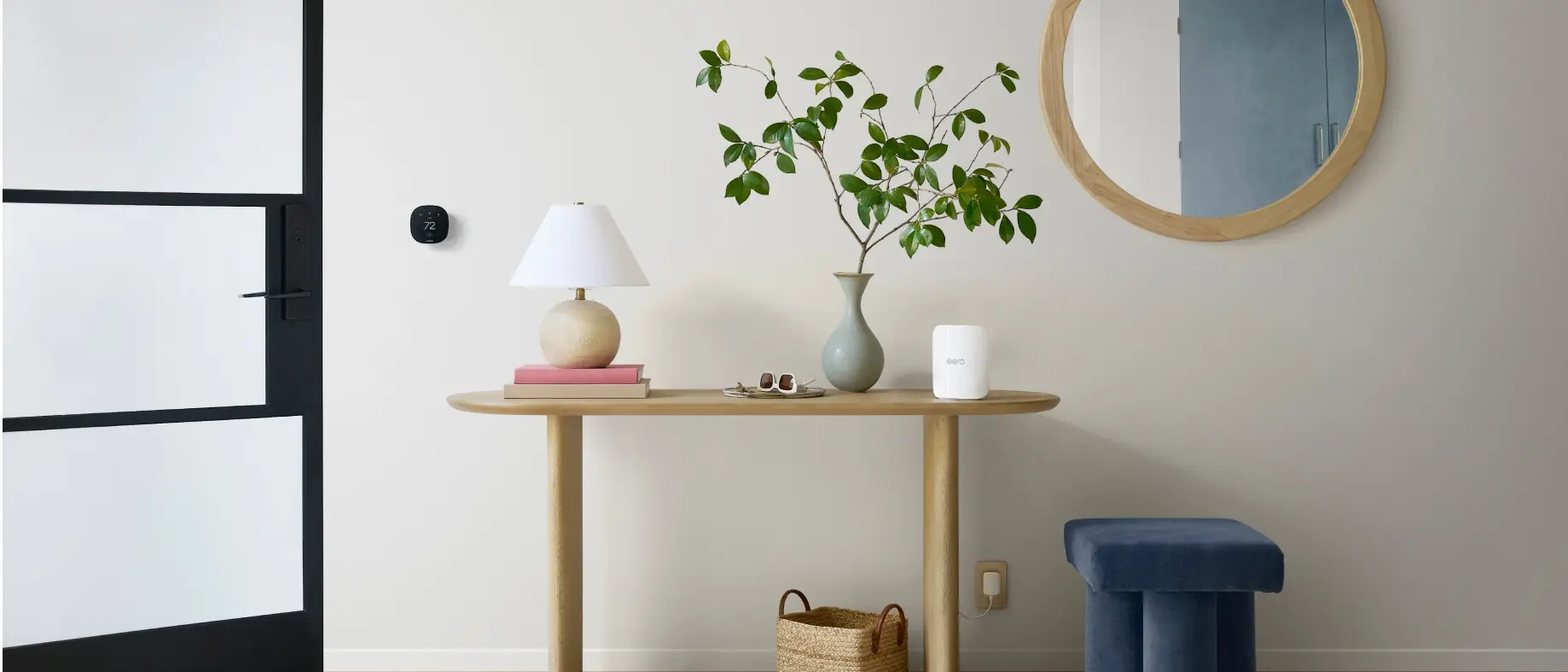 An eero Pro 7 router placed in the open on an entryway table