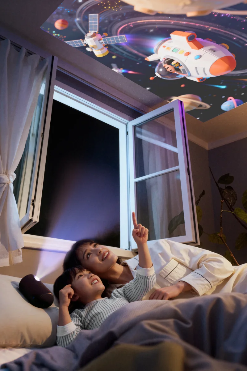 Nebula Capsule 3 Laser projecting an image onto a bedroom ceiling